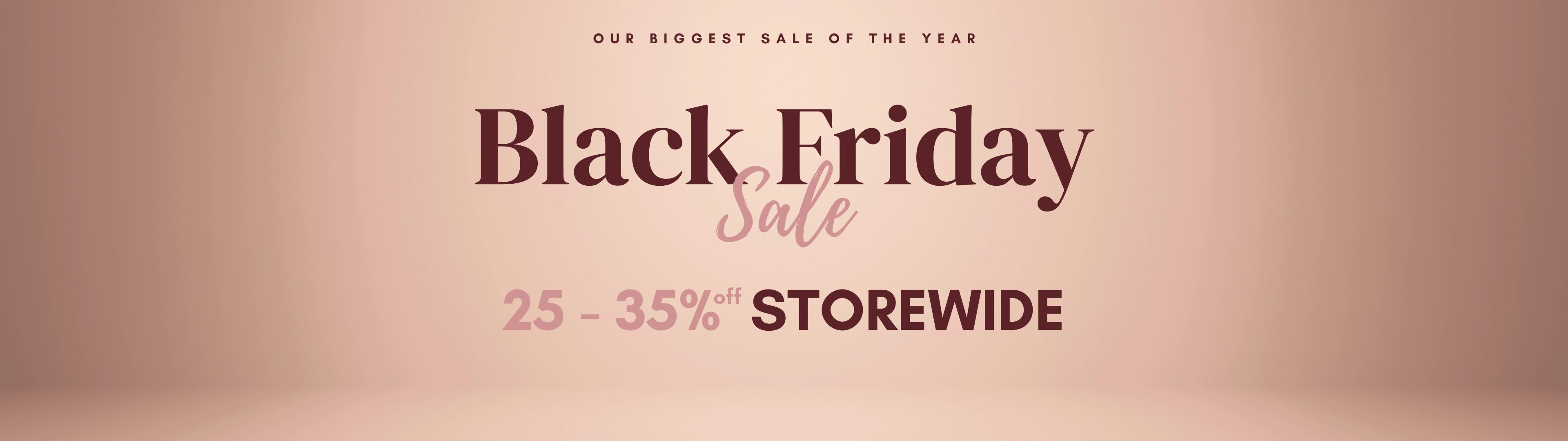 Black Friday sale banner with text on a pink background